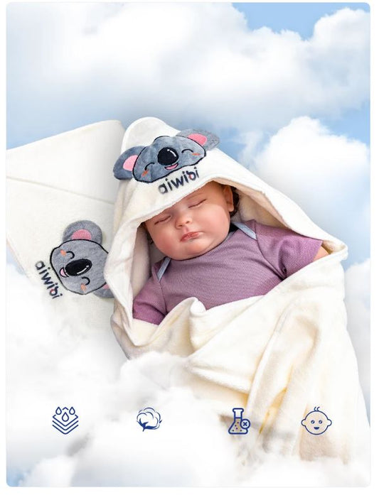 Manta tipo koala cremosa con capucha y apliques de orejas